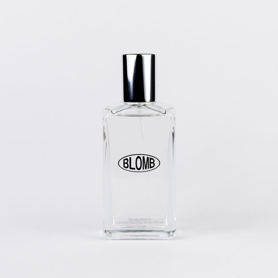Blue box with yellow text featuring the brand 'BLOMB' on a white background
