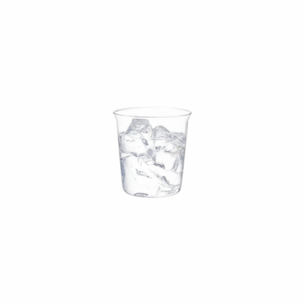 Clear glass filled with water and ice cubes on a white background