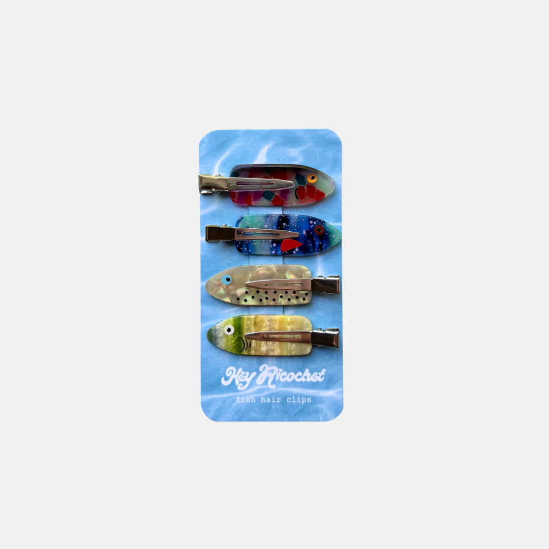 Set of colorful hair clips on a blue card with 'Hey Ricochet' branding.