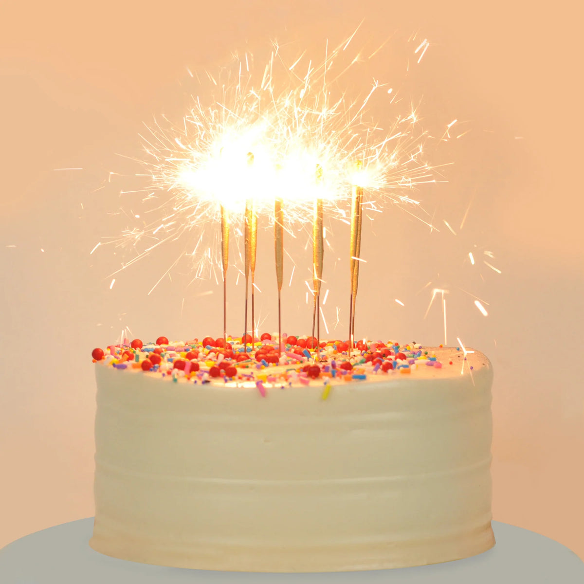 Pack of birthday "candle" sparklers with a blue label on a white background