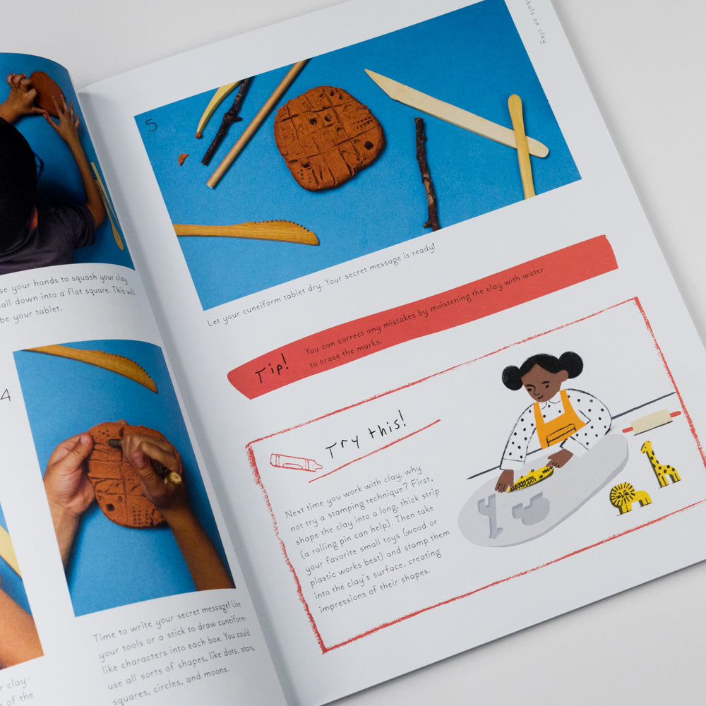 Open book with illustrations and text on a white background